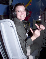 Lisa Tidwell giving the thumbs up from the cockpit.